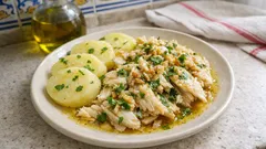 Alhada de raia à portuguesa: molho quente de alho e azeite, com batata cozida