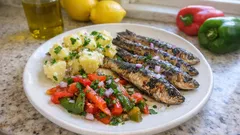 Sardinhas assadas com salada de batata e pimentos: simples, caseiro e cheio de sabor