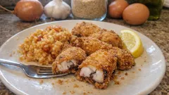 Filetes de polvo com arroz de forno: crocantes por fora, tenros por dentro