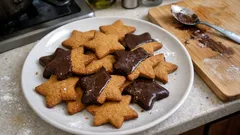 Estrelas de Natal com gengibre e chocolate: bolachas simples e mesmo festivas